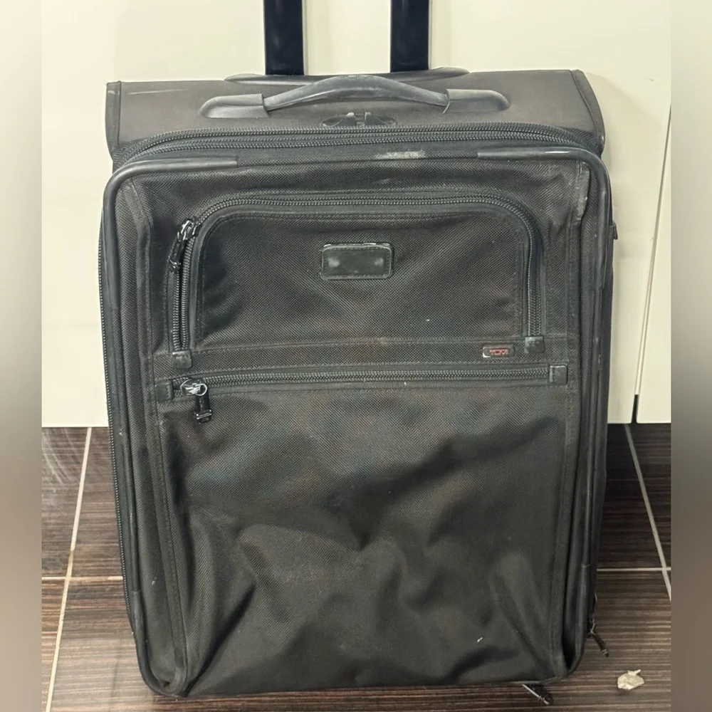 Tumi Black Rolling Carry-On Travel Bag